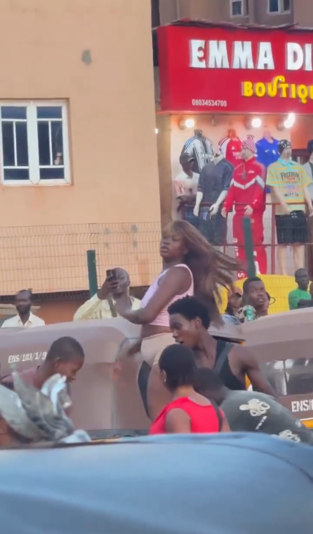 Panic At Liberty Junction As Unidentified Woman Displays Sudden Mental Breakdown Near Abakpa Hotel